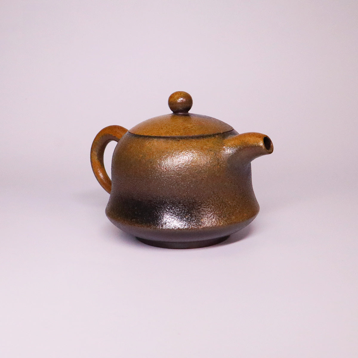 Handcerami artisan Rongchang Chinese pottery teapot in brown handmade ceramic with round lid and handle