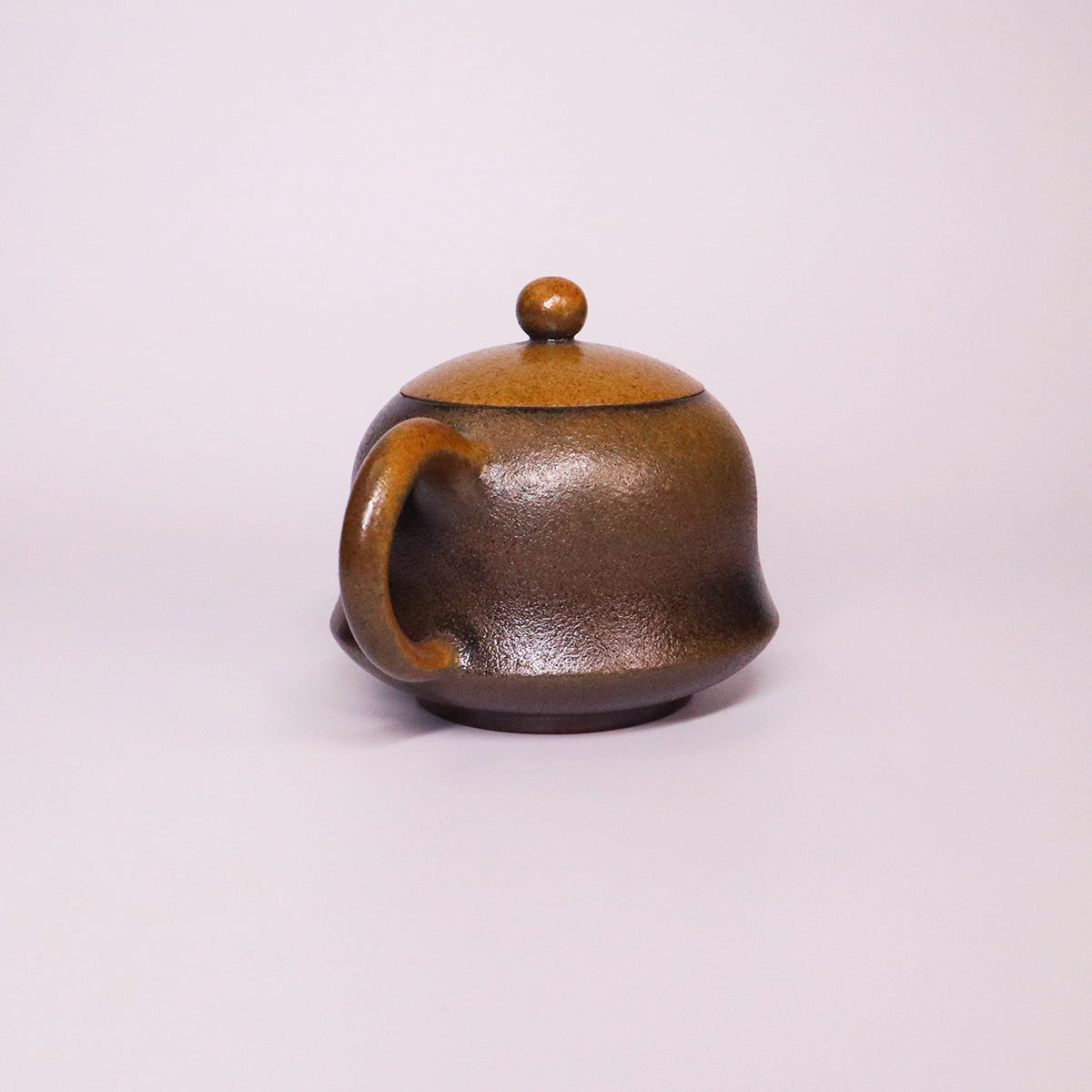 artisan Rongchang Chinese pottery teapot handmade pure ceramics with a textured brown finish