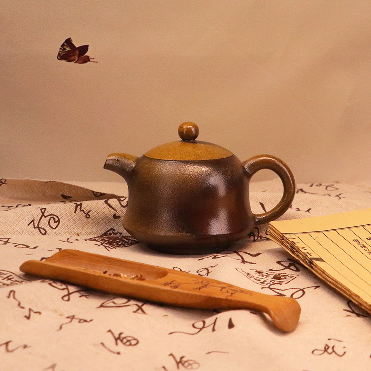 Artisan Rongchang Chinese pottery teapot handmade with smooth brown and tan ceramic finish