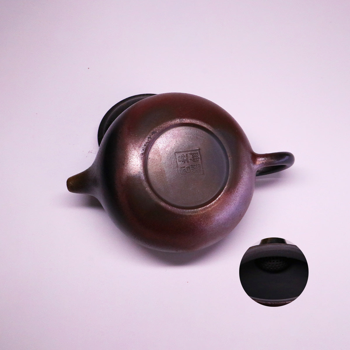 Chinese Handcrafted Fanggu Teapot top view showing handmade ceramic details and signature stamp