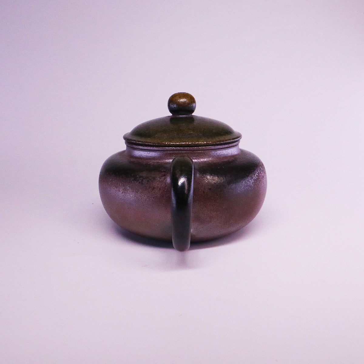 Chinese Handcrafted Fanggu Teapot in dark glazed pure handmade ceramics with rounded body and lid