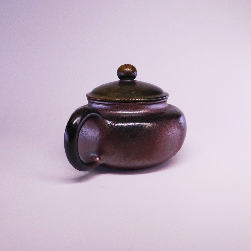 Chinese Handcrafted Fanggu Teapot made of pure handmade ceramics with a smooth rounded design