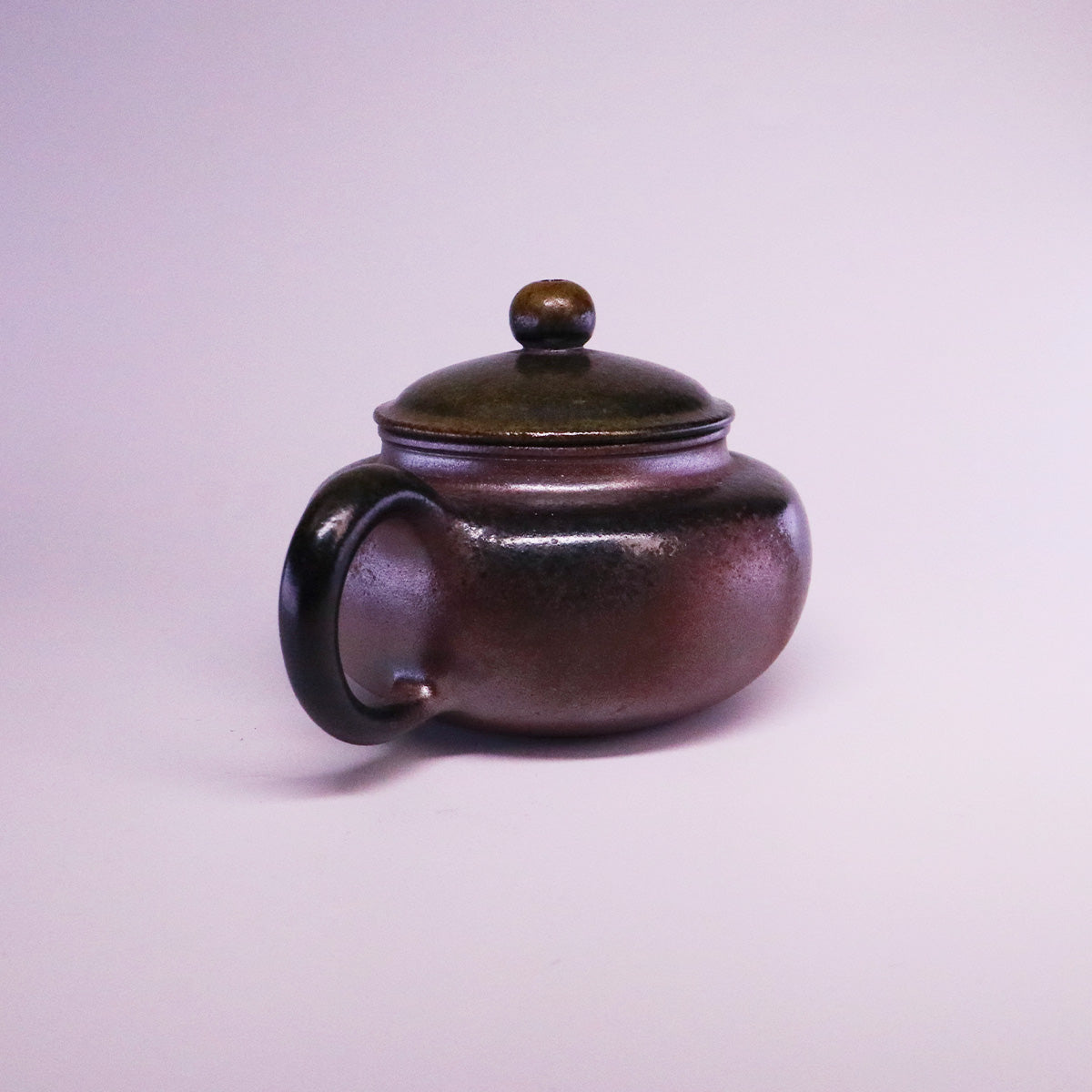 Chinese Handcrafted Fanggu Teapot made of pure handmade ceramics with a smooth rounded design
