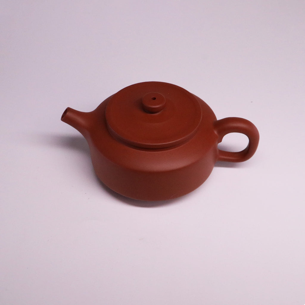 Chinese Rongchang handcrafted teapot in pure handmade ceramics with traditional brown finish