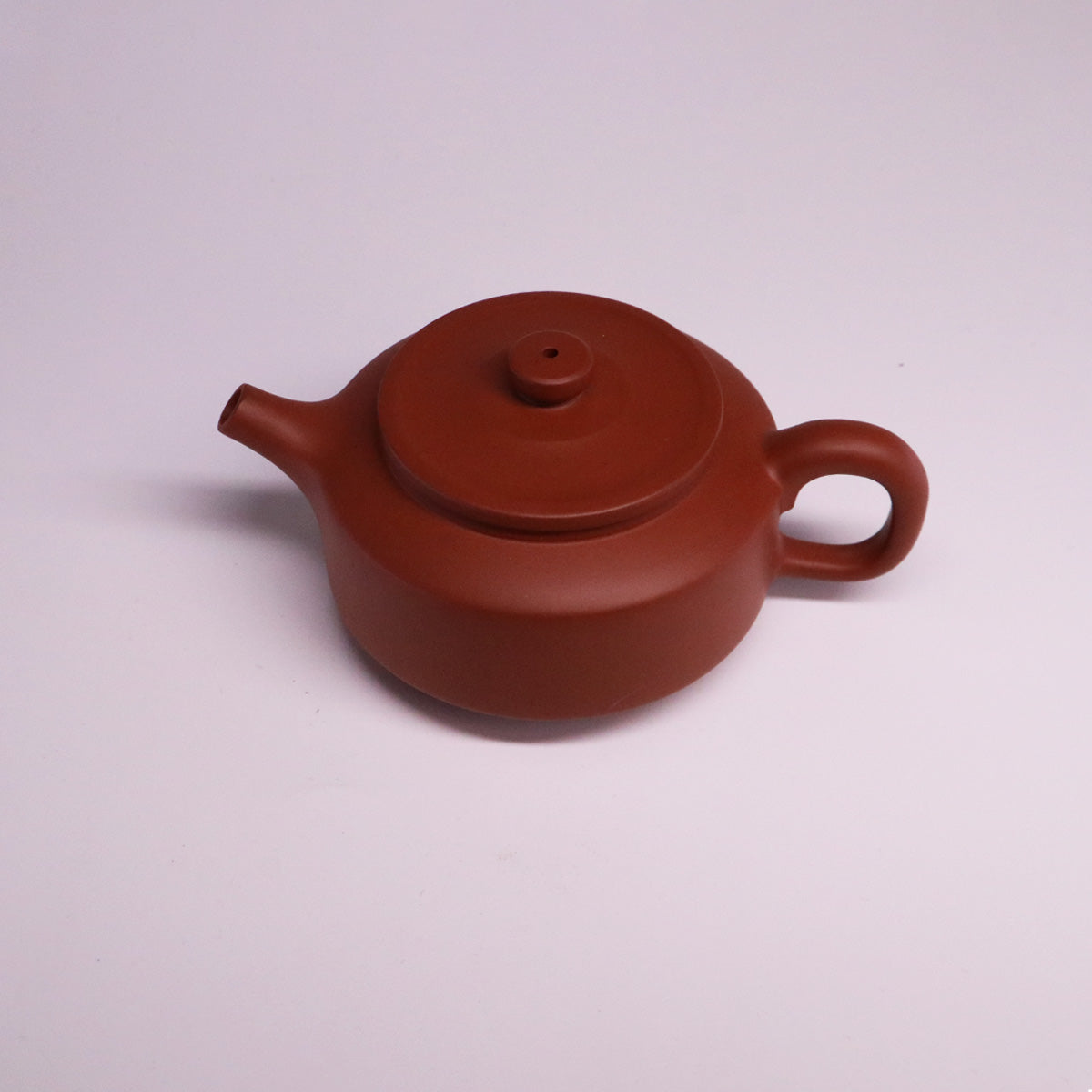 Chinese Rongchang handcrafted teapot in pure handmade ceramics with traditional brown finish