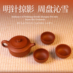 Chinese Rongchang handcrafted teapot with three matching tea cups on a woven mat background