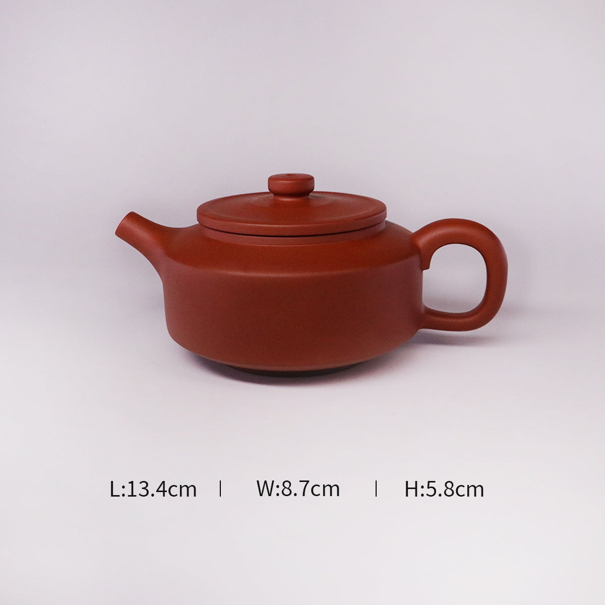 Chinese Rongchang handcrafted teapot in deep red pure handmade ceramics with lid and handle