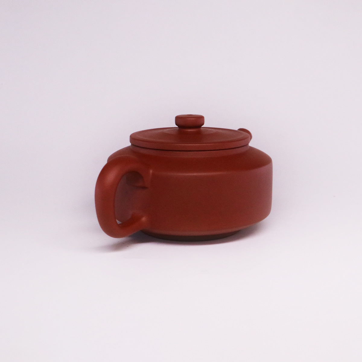 Chinese Rongchang handcrafted teapot made of pure handmade ceramics with a smooth rounded design