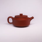 Chinese Rongchang handcrafted teapot in pure handmade ceramics with smooth reddish-brown finish
