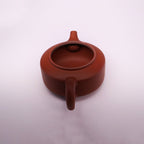 Chinese Rongchang handcrafted teapot made of pure handmade ceramics with smooth reddish-brown finish