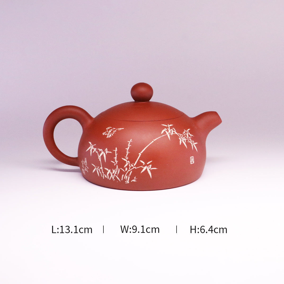Handcrafted ceramic teapot in reddish brown with white bamboo design and round handle by handcerami
